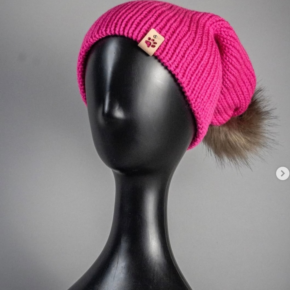 Knitted beanies with cat or paw tags